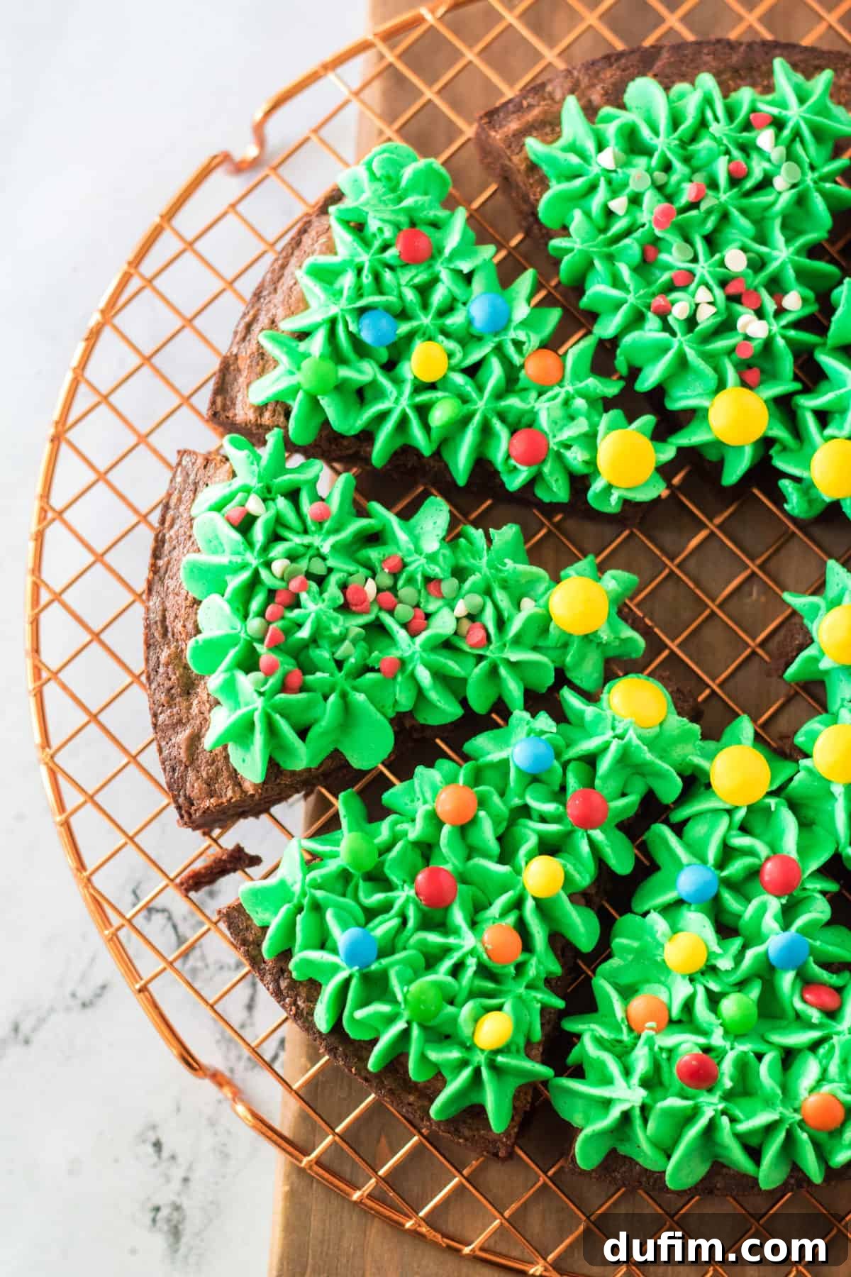 Christmas tree brownies on metal wire rack 