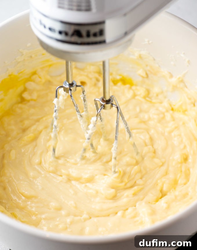 Smooth, creamy cheesecake batter after cream cheese and sugar are combined.