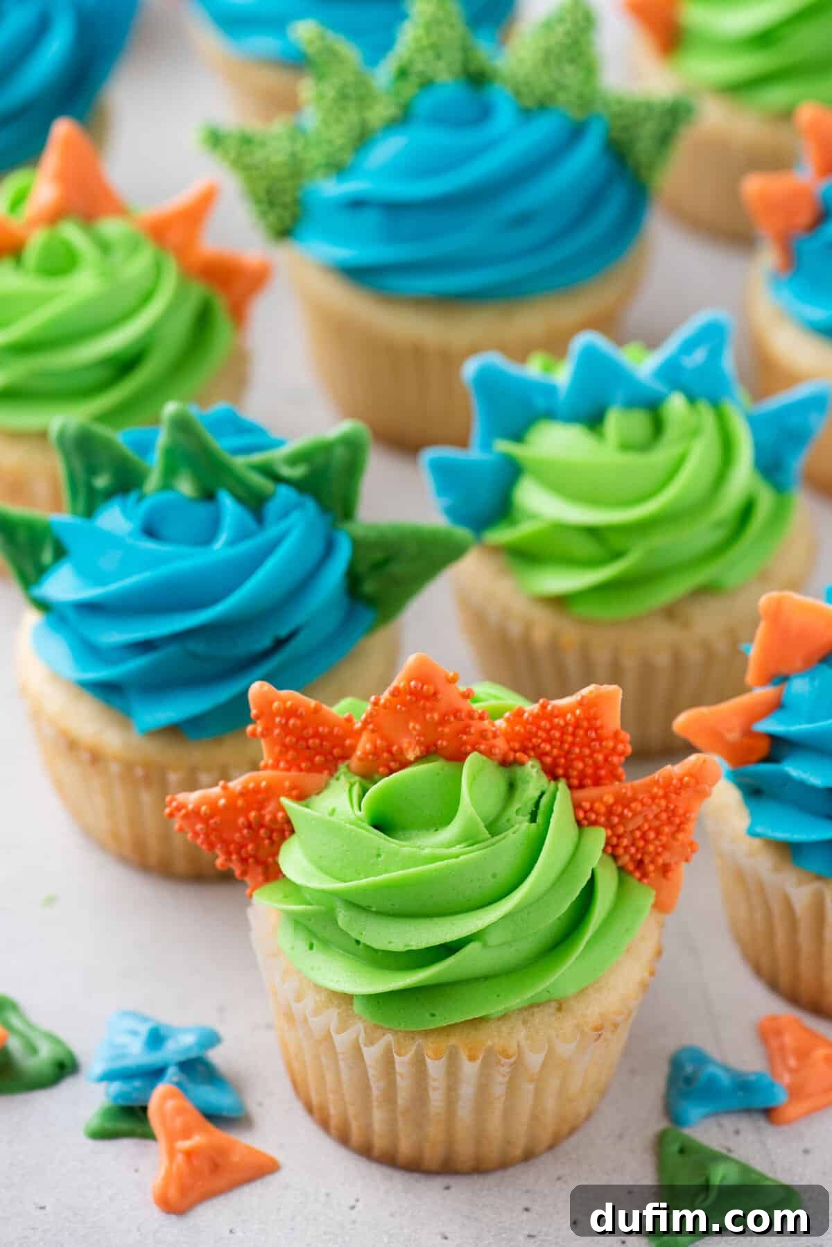 Dinosaur cupcakes topped with almond bark spikes