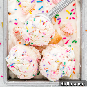 Overhead view of birthday cake ice cream scoops in loaf pan