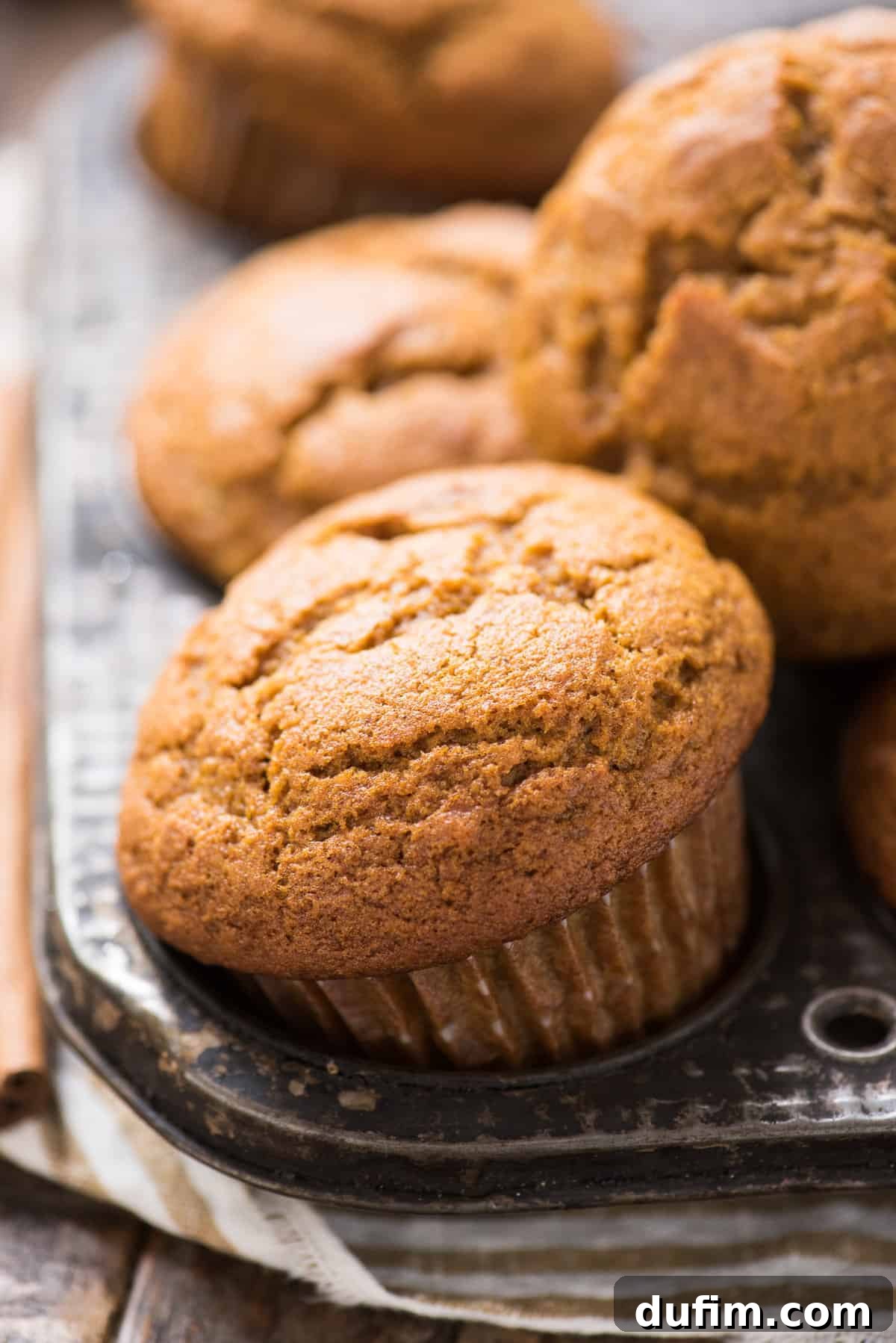 Autumn Spiced Gluten-Free Pumpkin Streusel Muffins 12 gluten free pumpkin muffin in metal muffin pan