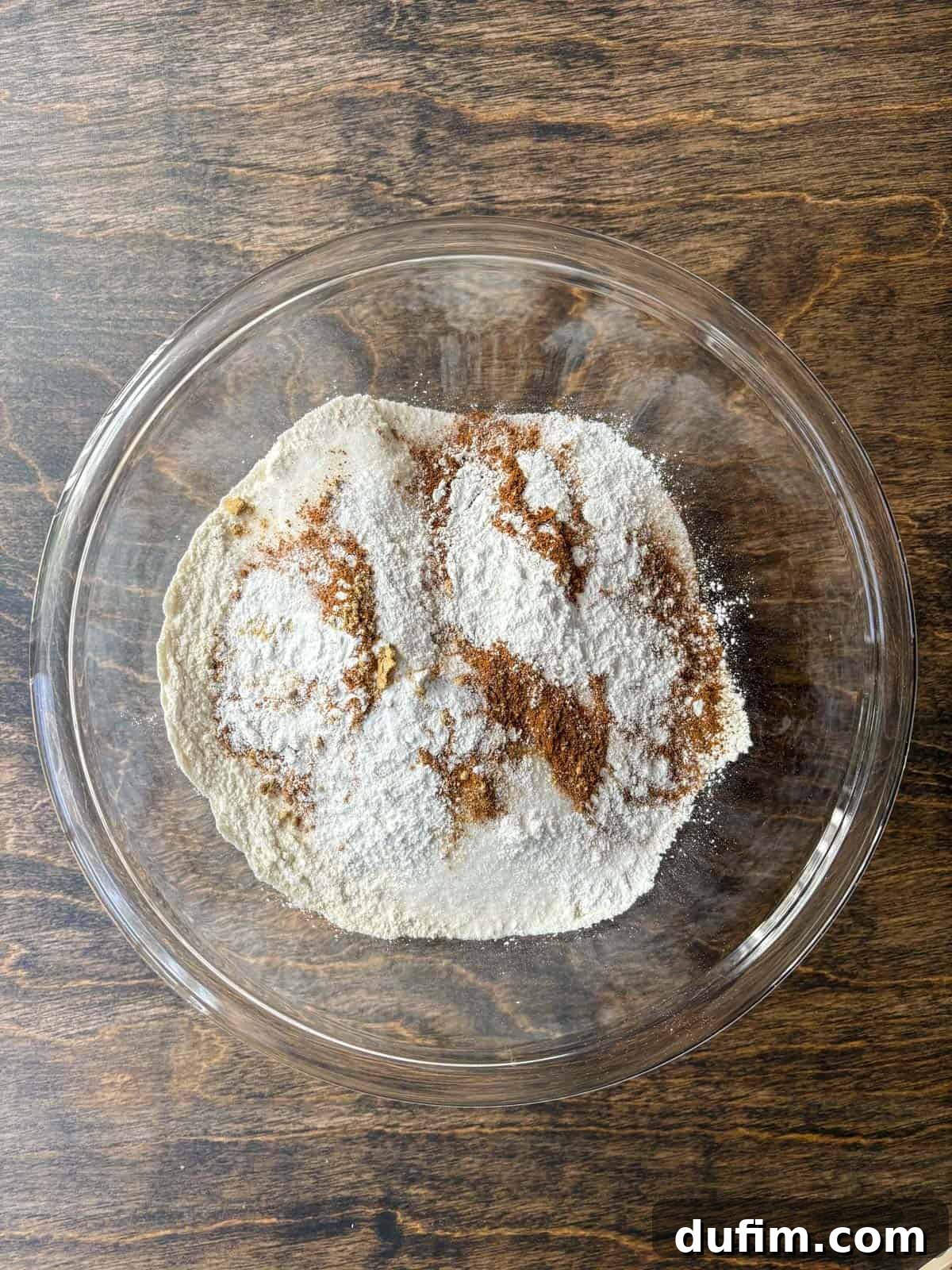Autumn Spiced Gluten-Free Pumpkin Streusel Muffins 6 Mixing dry ingredients for gluten-free pumpkin muffins