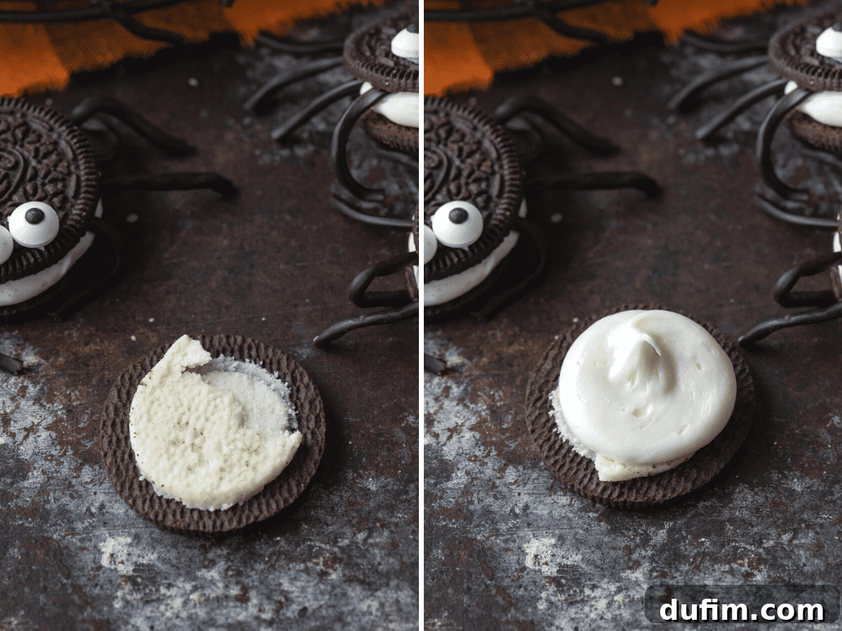 Adding Frosting to Oreo Spiders An Oreo cookie split open, with white frosting being piped onto the cream-filled half.