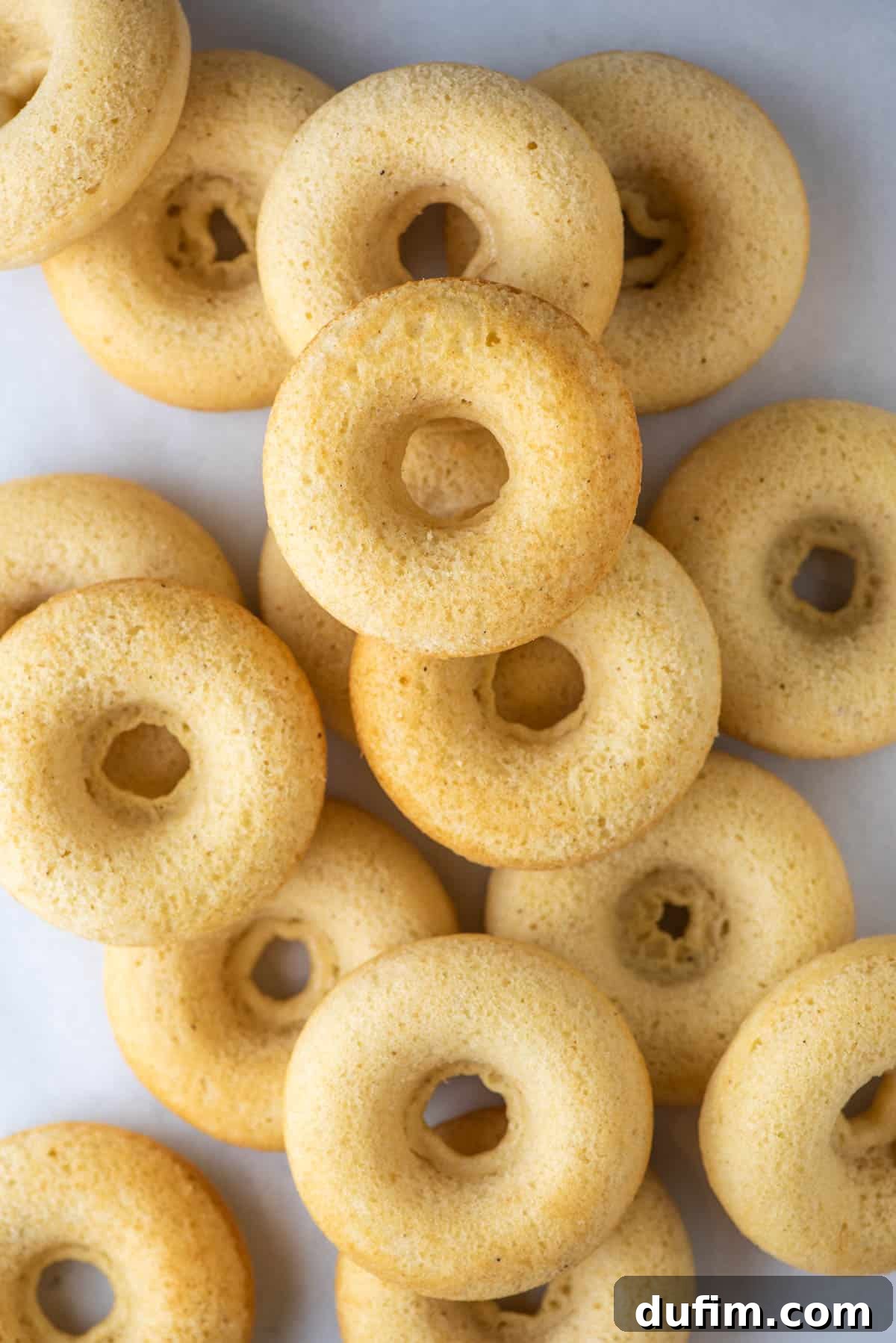 A delicious pile of various gluten free donuts ready to be enjoyed