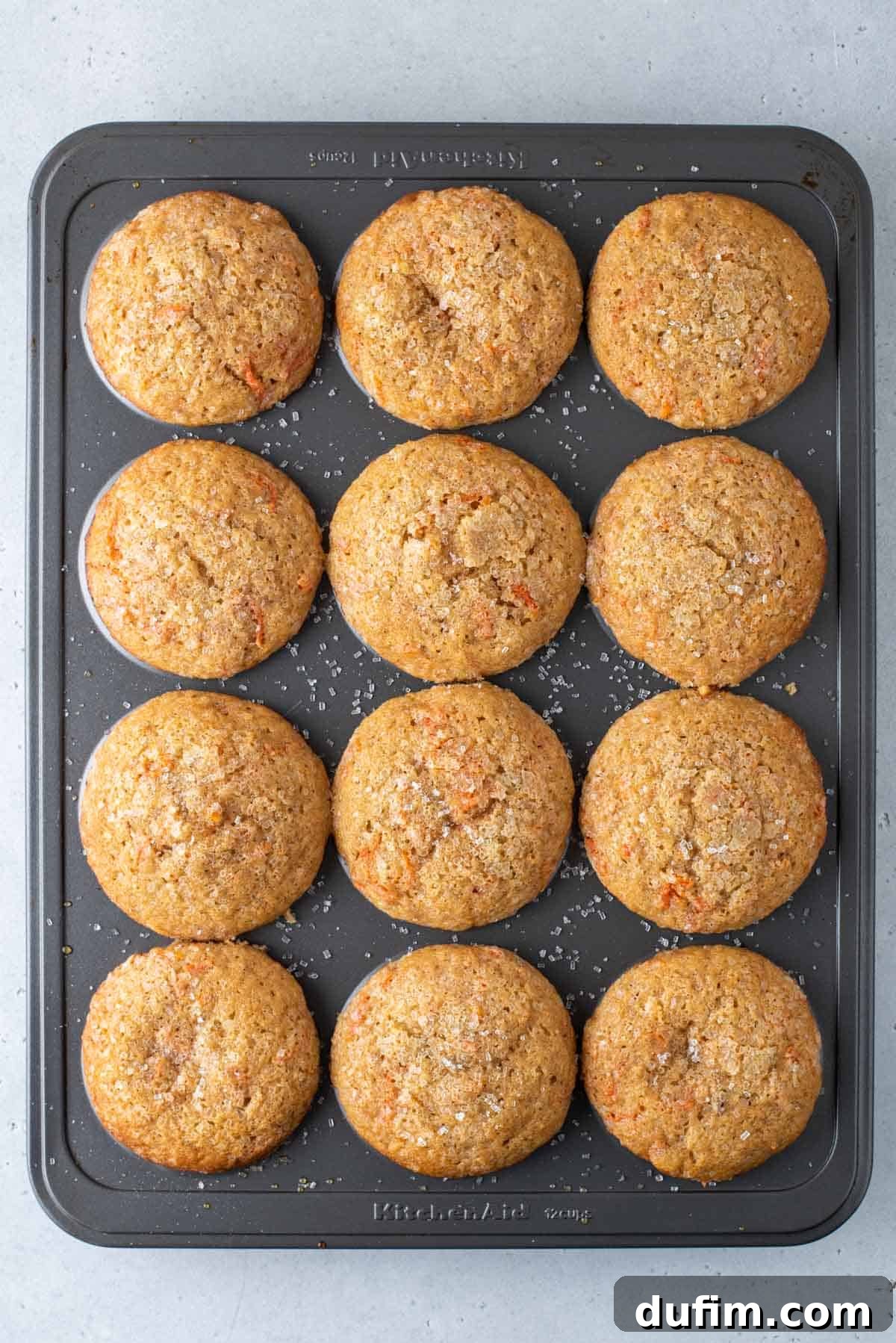 Irresistible Carrot Muffins 11 Finished carrot cake muffins in a muffin pan