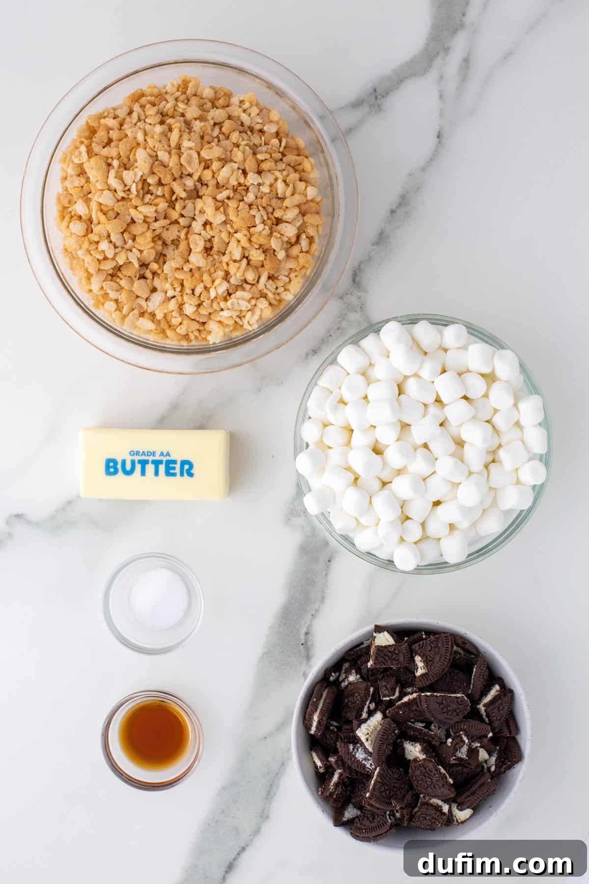 Oreo Dream Krispie Bars 4 the ingredients for oreo rice krispie treats including oreos, vanilla, mini marshmallows, butter, salt, and rice krispies cereal