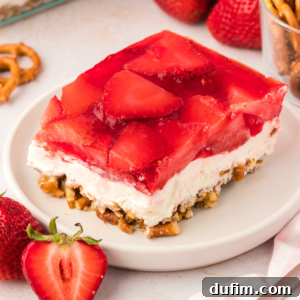 A delicious Strawberry Jello Pretzel Salad prepared in a baking dish.