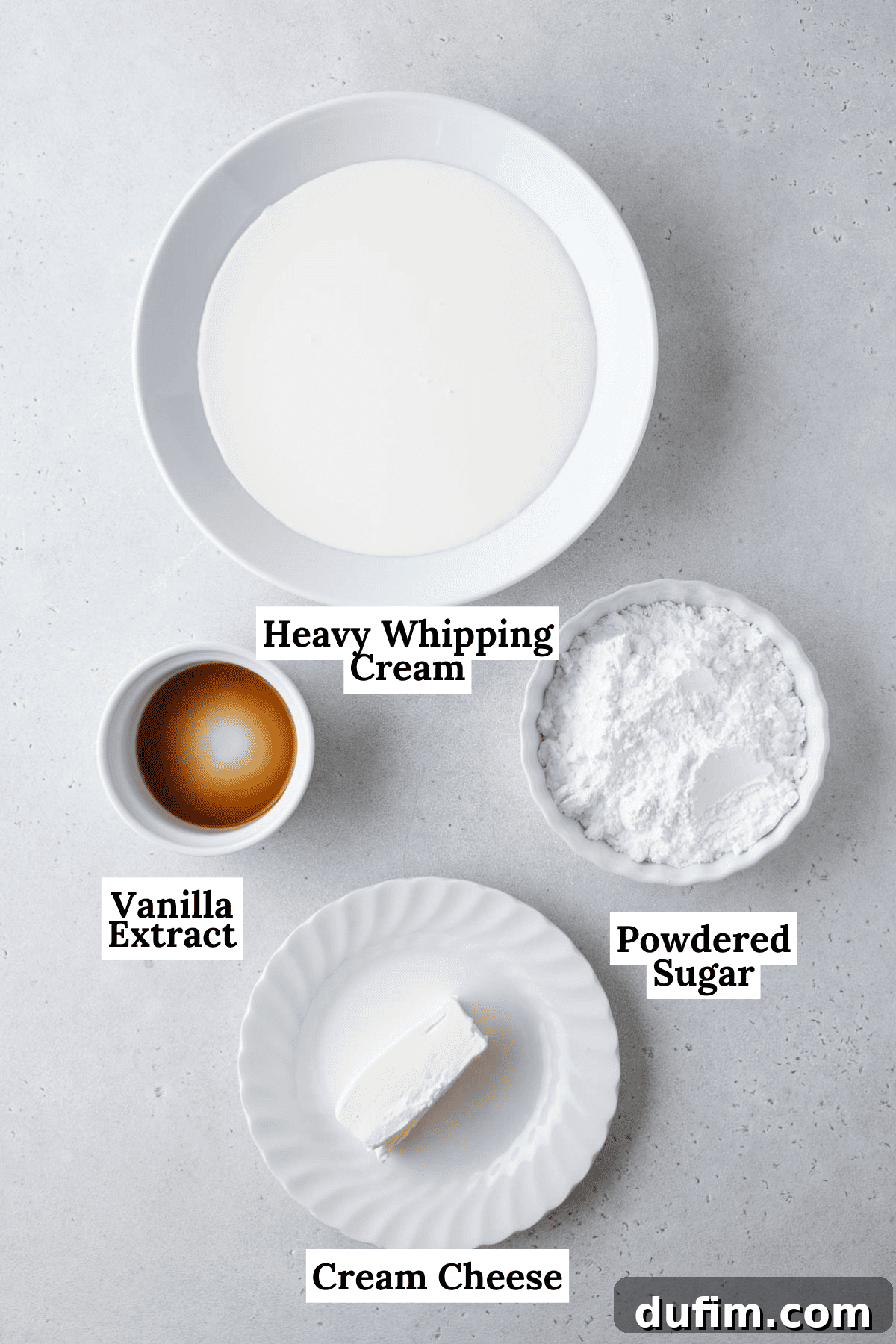 Essential ingredients for stabilized whipped cream: cream cheese, powdered sugar, heavy whipping cream, and vanilla extract.