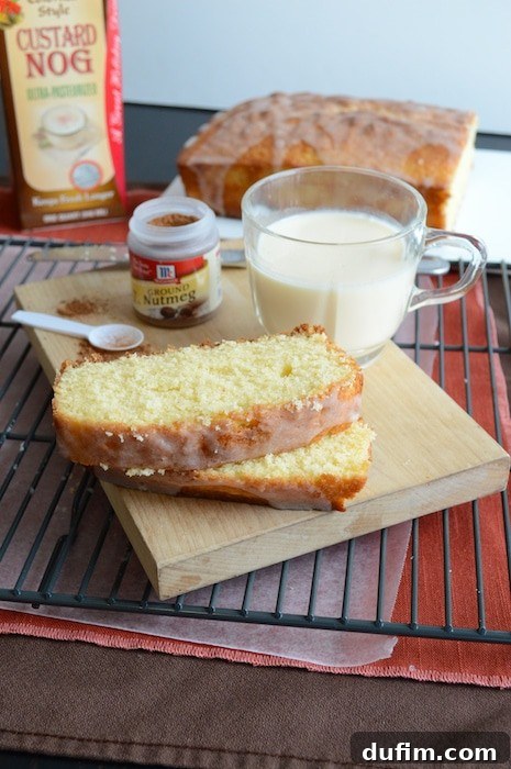 A festive spread featuring the Whipped Eggnog Loaf Cake, perfect for holiday entertaining.