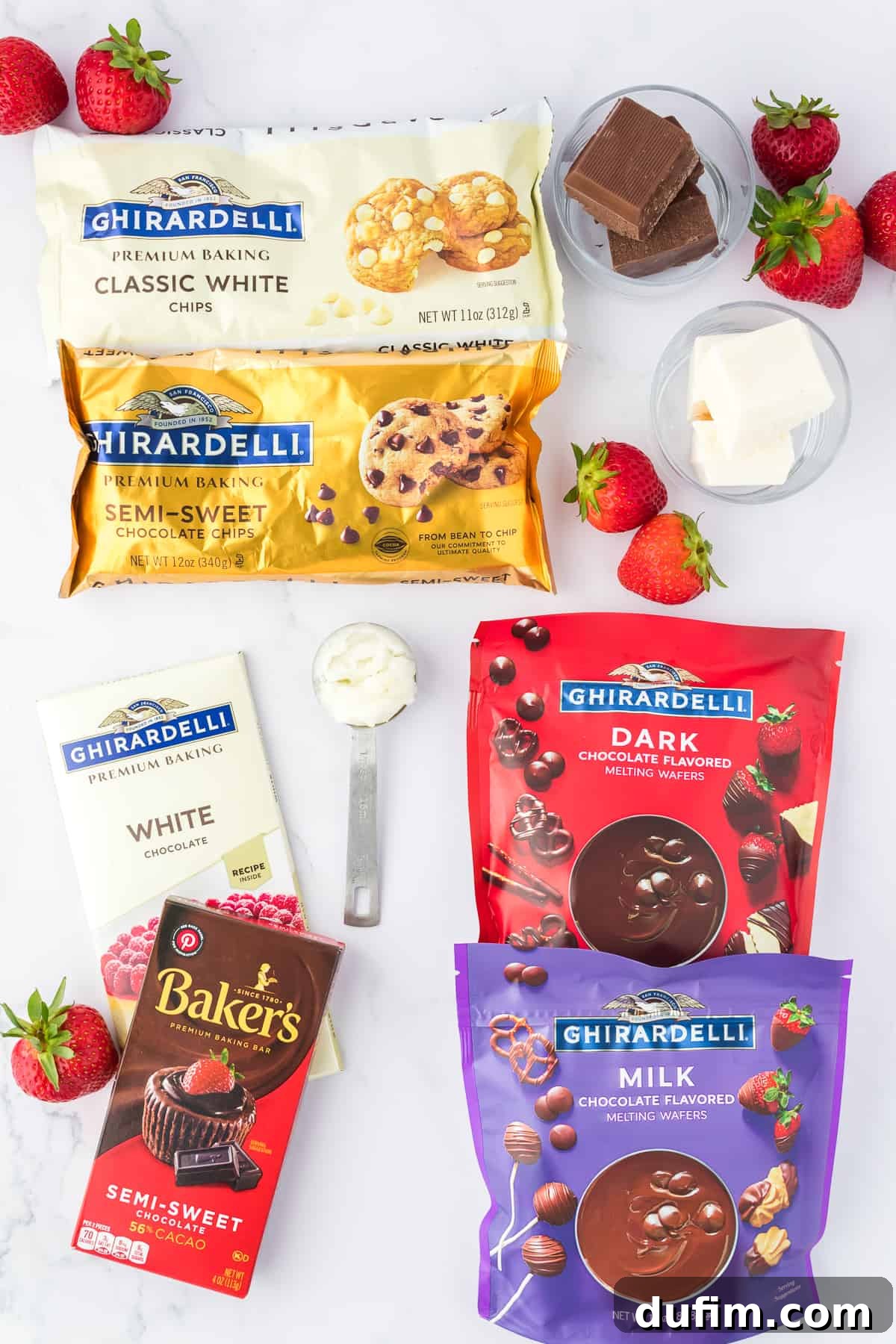 Irresistible Chocolate Dipped Strawberries 3 Ingredients for chocolate covered strawberries, including fresh strawberries, various bags and bars of Ghirardelli and Baker's chocolates, and a bottle of coconut oil.