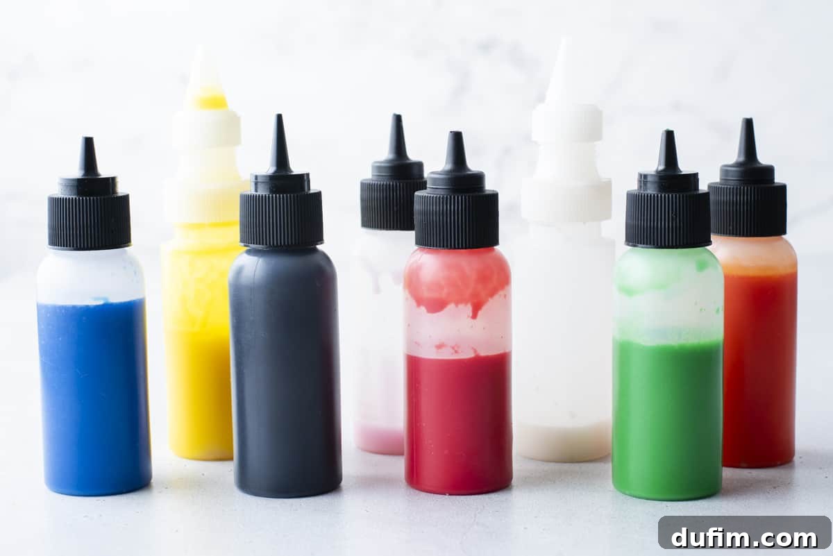 Sweet bottles full of colored royal icing.