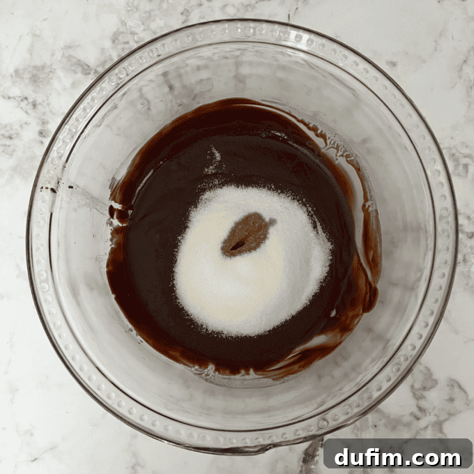 Decadent Flourless Chocolate Cake 10 Sugar, salt, and vanilla added to chocolate mixture