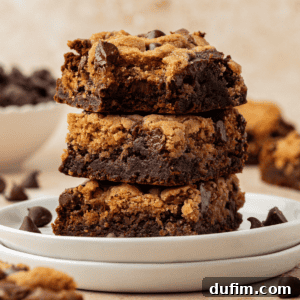 Three brookies stacked in a tower on a stack of two small white plates with more brookies and chocolate chips scattered around, indicating a delightful homemade brookie recipe.