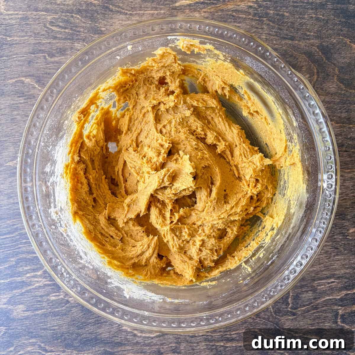 Cozy Autumn Pumpkin Spice Cookies 11 pumpkin cookie dough in a clear glass bowl
