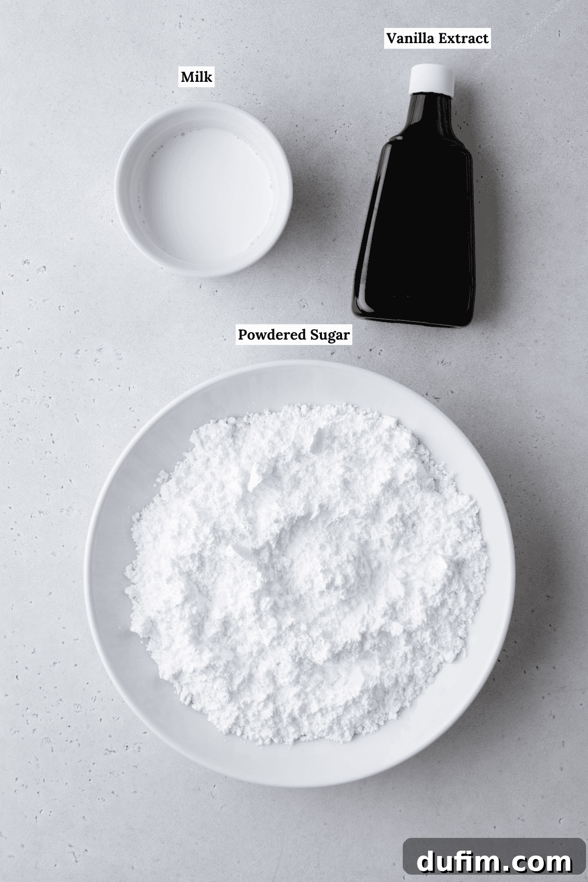 Effortless Donut Glaze Perfection 4 Ingredients for homemade donut glaze, including powdered sugar, milk, and vanilla extract, arranged on a surface.