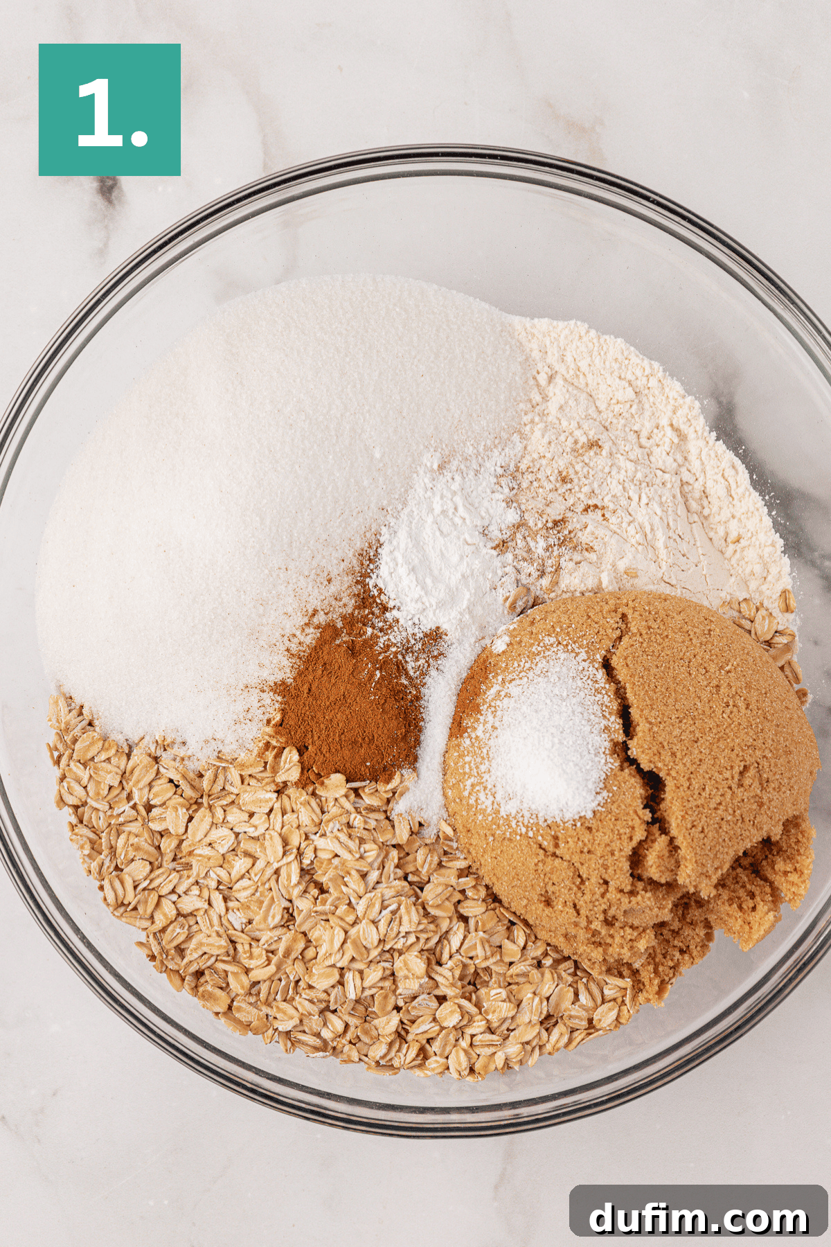 Oats, flour, granulated sugar, brown sugar, baking powder, salt, and cinnamon in a large glass bowl