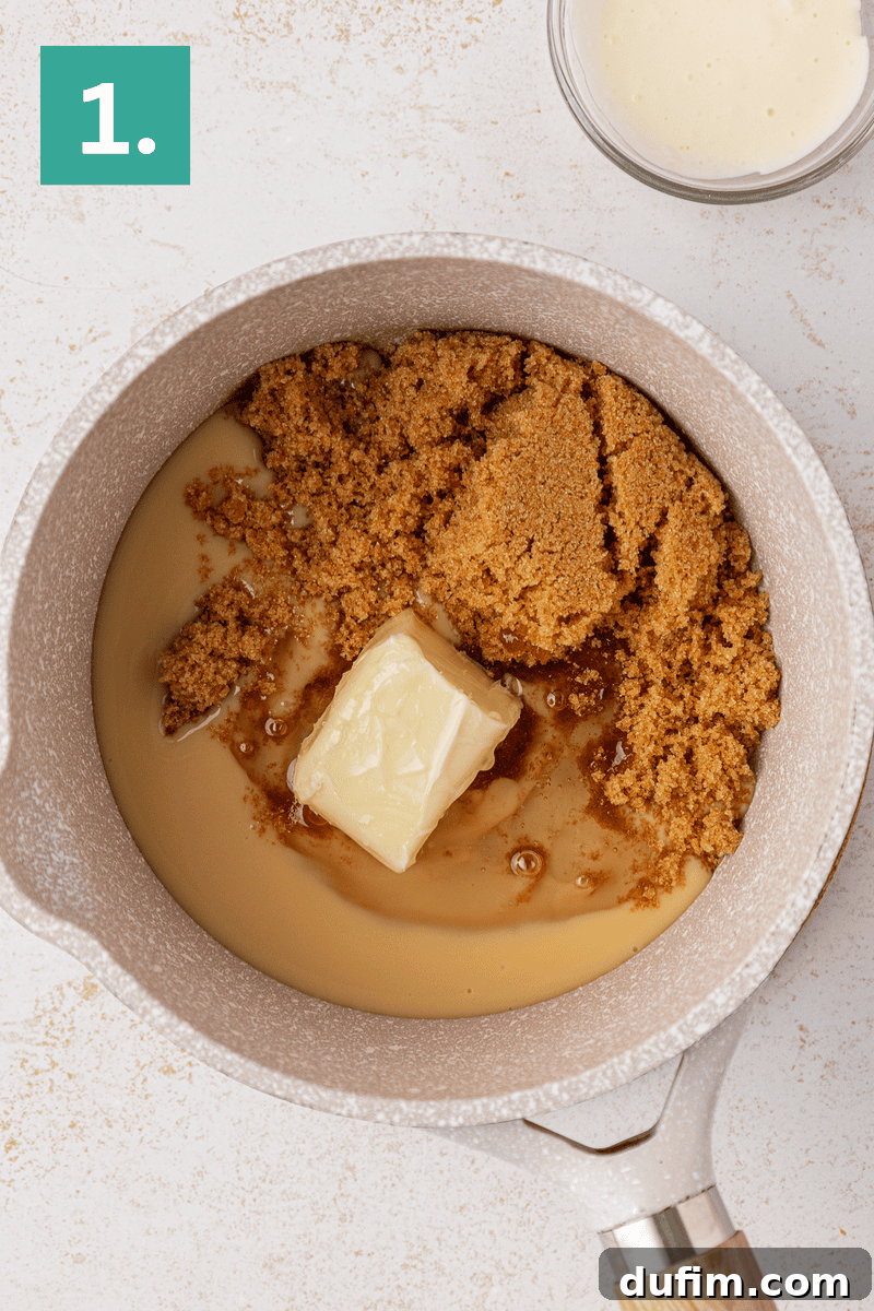 Caramel Pecan Turtle Thumbprints 14 A saucepan with a block of butter, brown sugar, and condensed milk inside, ready to be mixed. A small glass bowl with a creamy mixture sits nearby. The image is labeled with a green box and the number 1 in the top left corner.