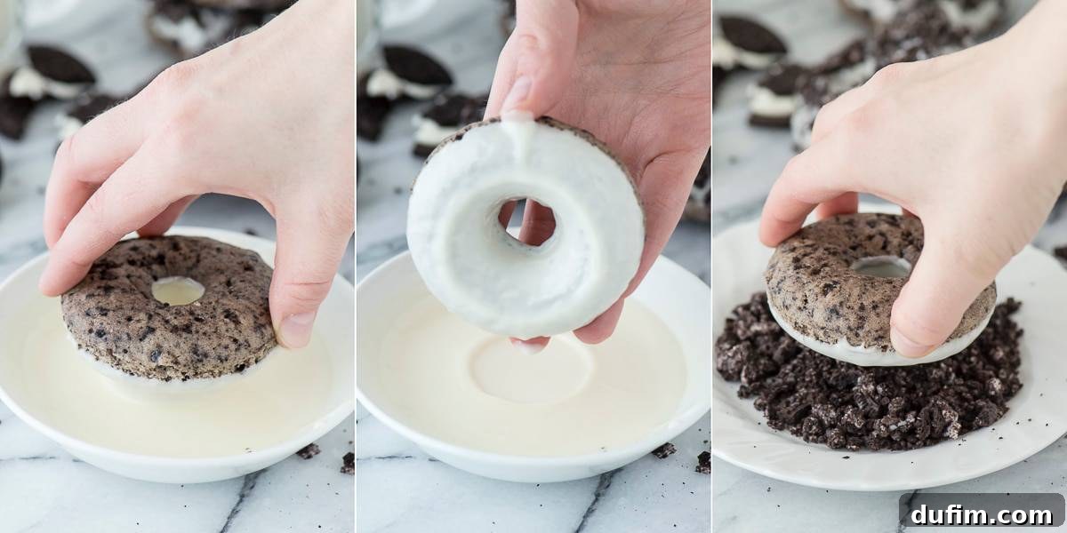 A top-down view of freshly baked Oreo donuts cooling on a wire rack, waiting to be glazed.