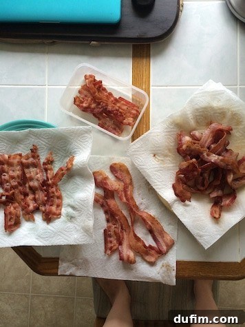 A plate piled high with crispy strips of bacon, a savory summer treat