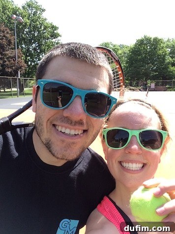 Working on improving our tennis skills together on the court