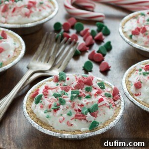 No bake mini white chocolate mousse pies are terrific for Christmas! Top them with red and green holiday chocolate chips!