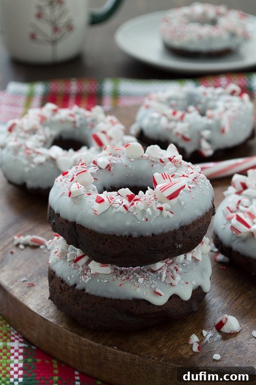 Holiday Chocolate Peppermint Donuts 5 Baked chocolate donuts infused with peppermint flavor, topped with white chocolate and crushed candy canes.
