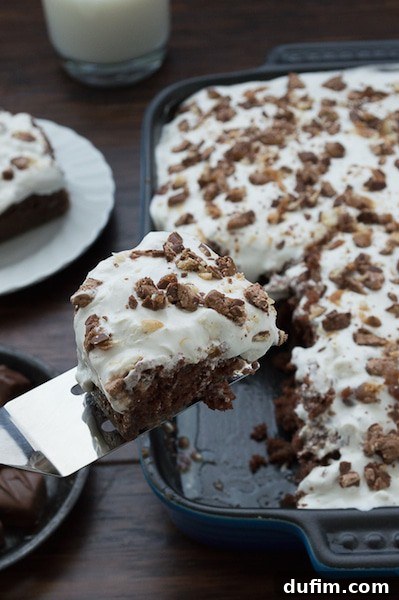 2014's Best Bites & December's Behind-the-Scenes 16 Decadent Candy Bar Cake loaded with chocolates
