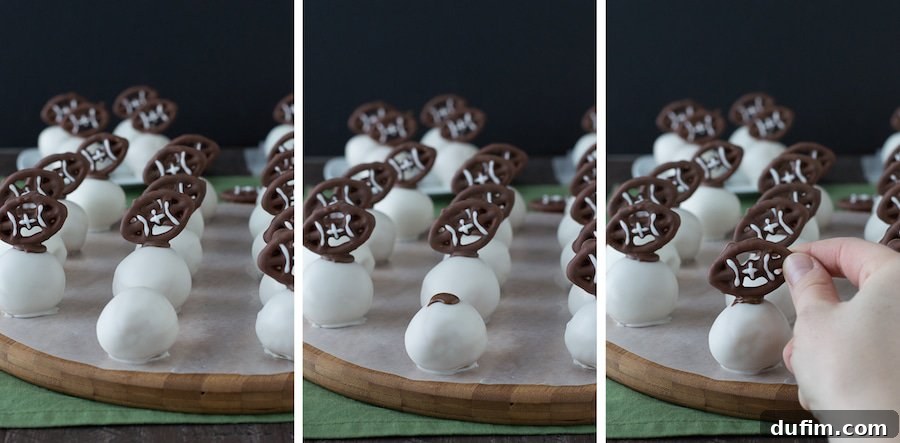 Football Oreo Balls - golden oreo balls dipped in white chocolate and topped with football pretzels! Make these for game day!