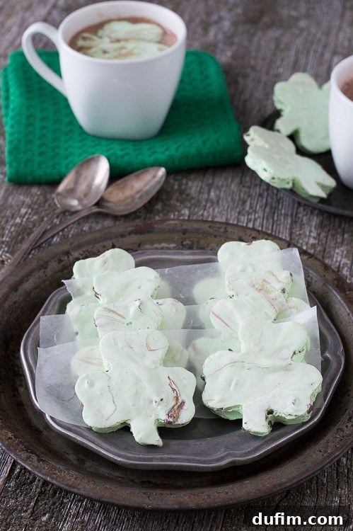 Mint Chocolate Chip Shamrock Marshmallows on a serving plate.