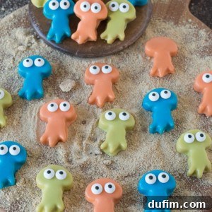 Colorful Jellyfish Oreo Balls with candy eyes, a perfect under-the-sea party dessert.