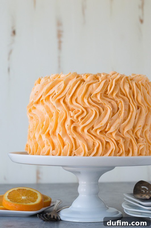 Sun-Kissed Orange Poppyseed Dream 4 Orange Poppyseed Cake - three layer orange poppyseed cake with a fresh orange buttercream!